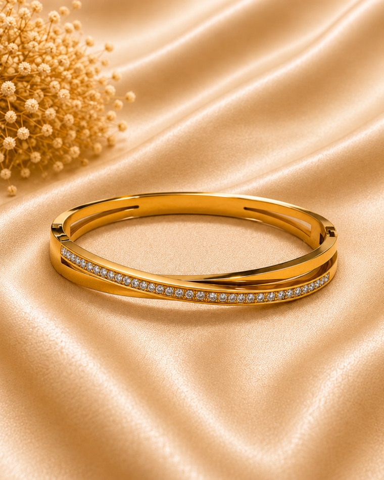 One Heart Motif Bangle in Gold on champagne satin