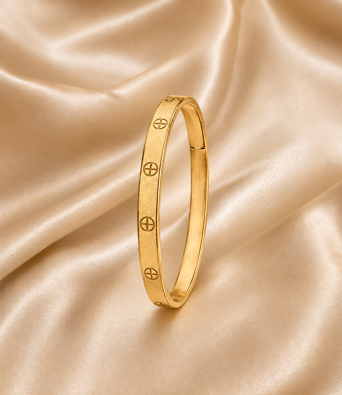 One Textured Zirconia Bangle in Gold on champagne satin